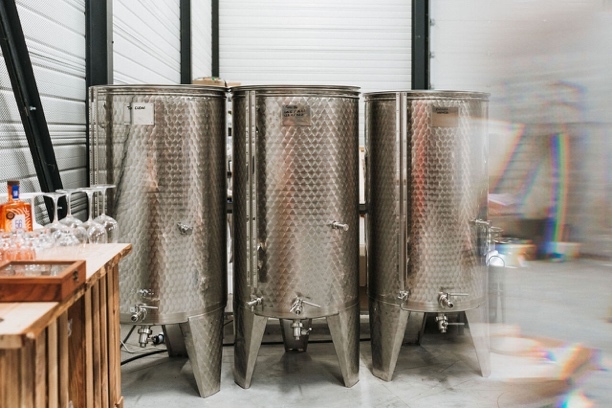 Several metal tanks in a room
AI-generated content may be incorrect.